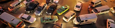 Lots of cars in a traffic congested intersection